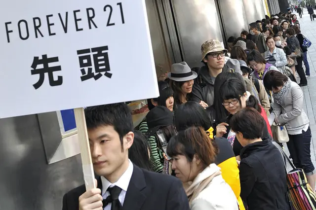 Queue up outside Forever 21 in Japan