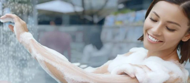 Woman using soap