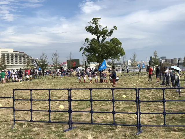 Japanese children playing rugby at the Kobe fan zone