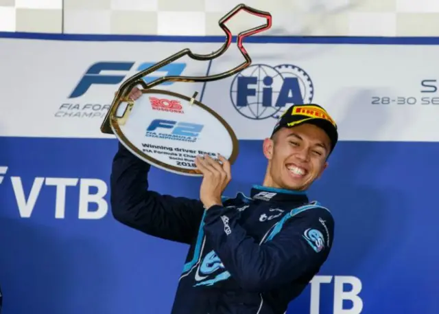 Alex Albon celebrates winning in Sochi in Formula 2 in 2018