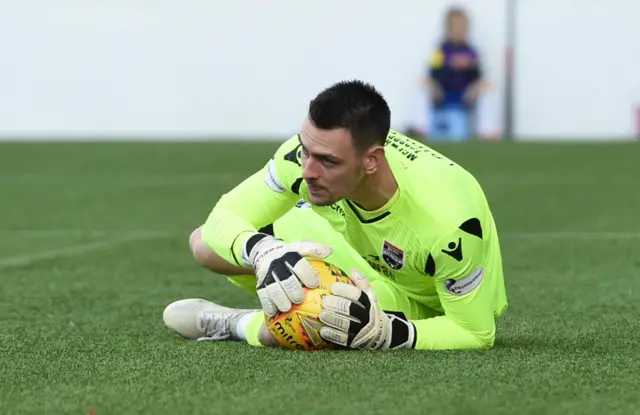 Ross Laidlaw holds on to Osman Sow's feeble penalty kick