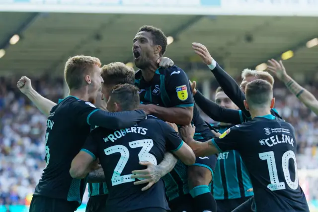 Swansea celebrate a goal