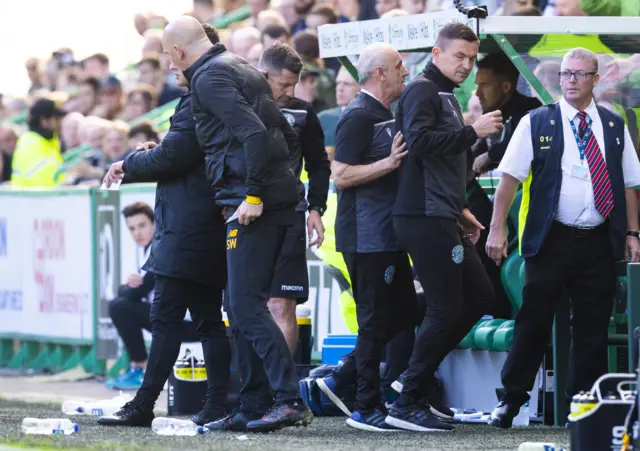 Paul Heckingbottom is ushered away by Hibs staff after his red card