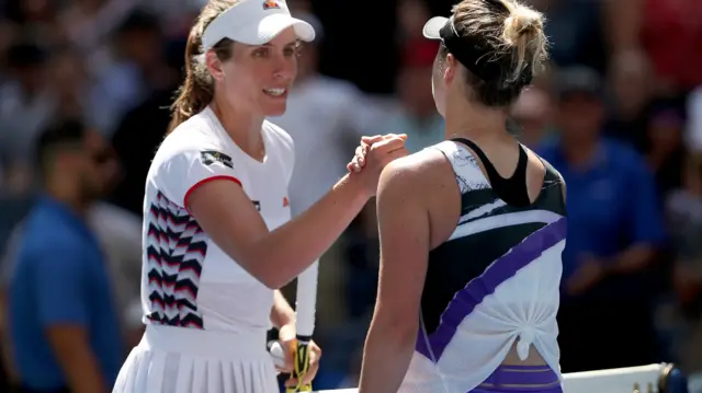 Johanna Konta and Elina Svitolina shake hands at the net