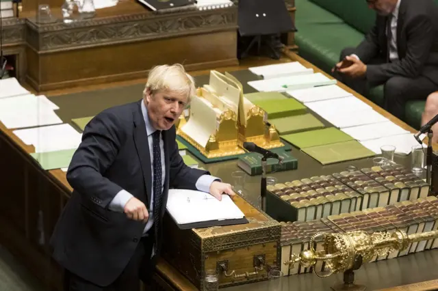 Prime Minister Boris Johnson speaks earlier at the despatch box