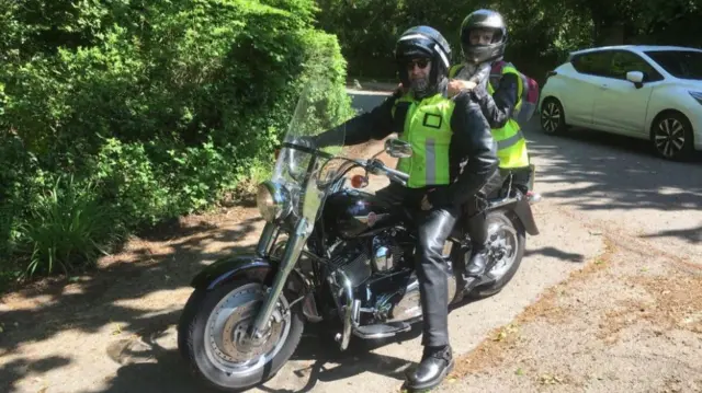 Bishop on motorbike