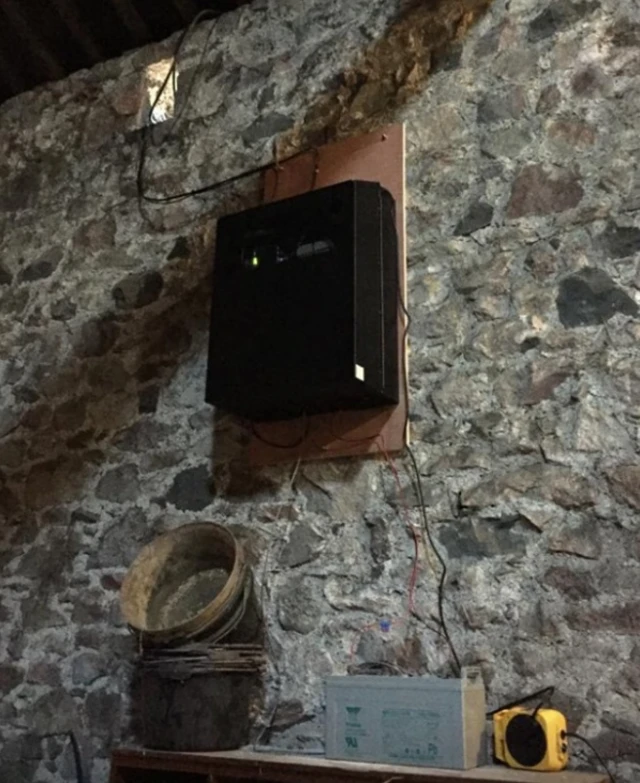 Black box on wall