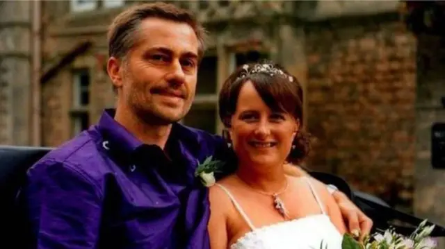 Cyclist Martyn Uzzell and his wife Kate on their wedding day