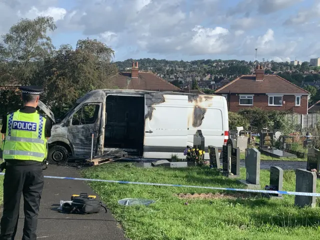 Burned out van