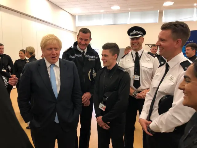 Boris Johnson with police officers in Wakefield