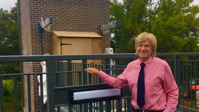 Michael Fabricant next to one of the new lift shafts