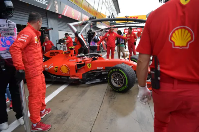 Charles Leclerc leaves the pits