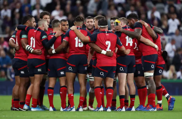 England players huddle up