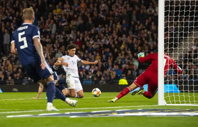 Yuri Zhirkov knocks the ball in under pressure from Stephen O'Donnell