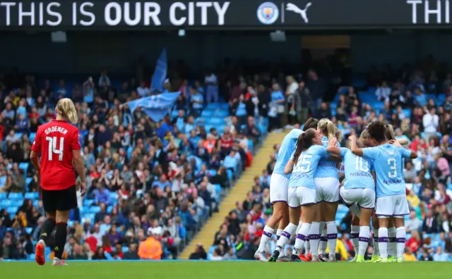 Man City celebrate Caroline Weir's goal