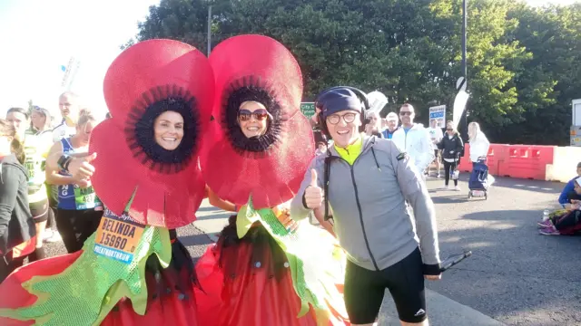 Runners dressed as poppies