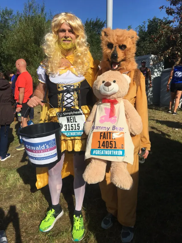 Runners dressed as Goldilocks and bear