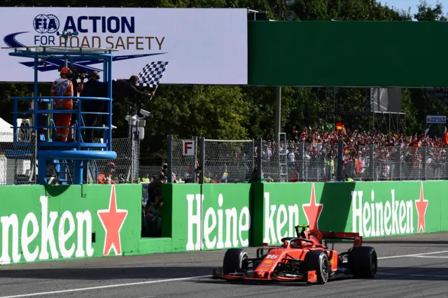 Charles Leclerc goes over the finish line