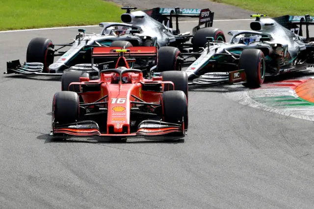 Charles Leclerc holds off the two Mercedes cars of Lewis Hamilton and Valtteri Bottas