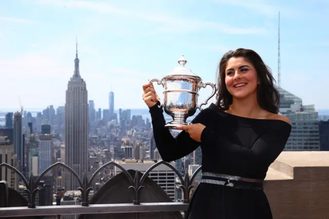 Bianca Andreescu with her US Open trophy at the Top of the Rock