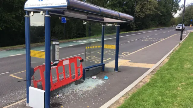 A damaged bus stop
