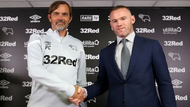 Wayne Rooney (right)