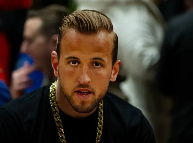 A fan wearing a Harry Kane mask at Alexandra Palace