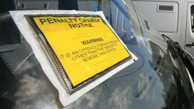 Parking ticket on windscreen