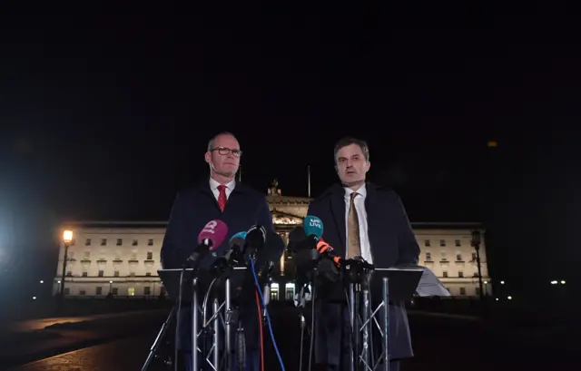 Simon Coveney and Julian Smith at Stormont