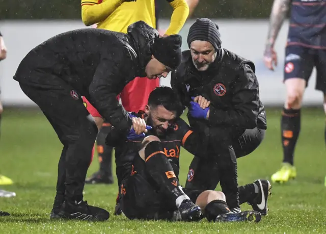 Dundee United's Nicky Clark suffers injury