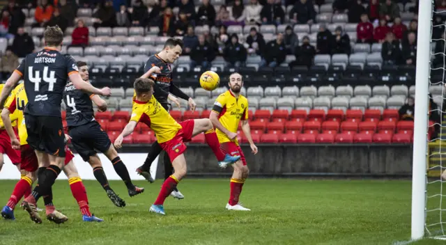 Dundee United's Lawrence Shankland scores