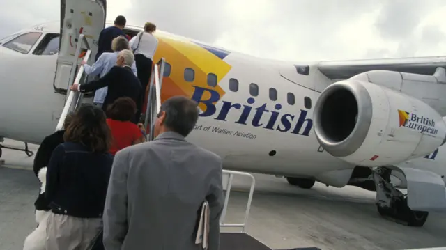 British European plane being boarded at Charles De Gaulle airport, Paris, in August 2001