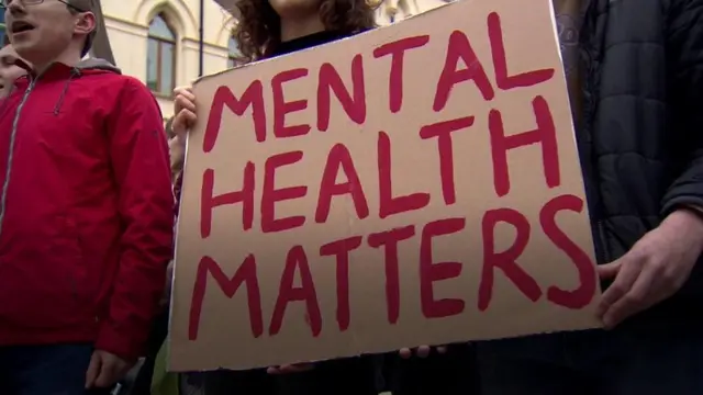 A placard that reads: Mental health matters