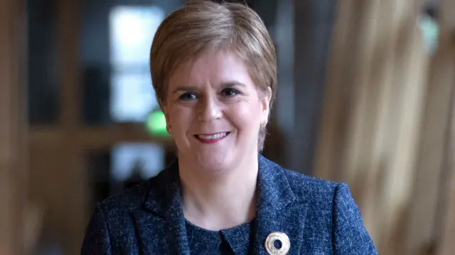 First Minister Nicola Sturgeon arrives ahead of First Minister's Questions at the Scottish Parliament in Edinburgh.