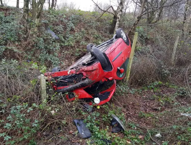 OVERTURNED CAR