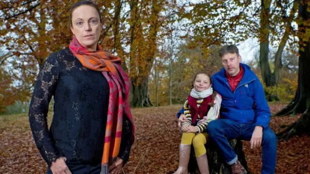 Rhiannon Davies with daughter Isabella and husband Richard