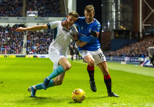 Stranraer's Cameron Elliot and Rangers' Andy Halliday tussle