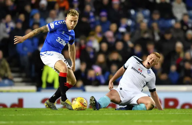 Rangers' Scott Arfield and Stranraer's Ryan Thomson