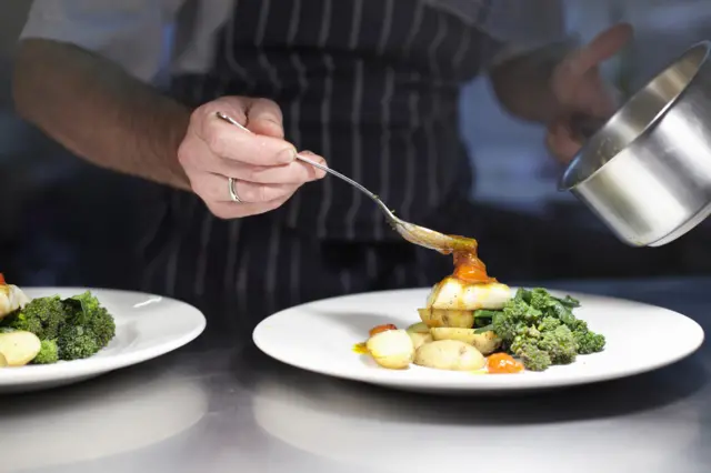 Stock image of a chef at work