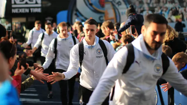 Man City players arrive