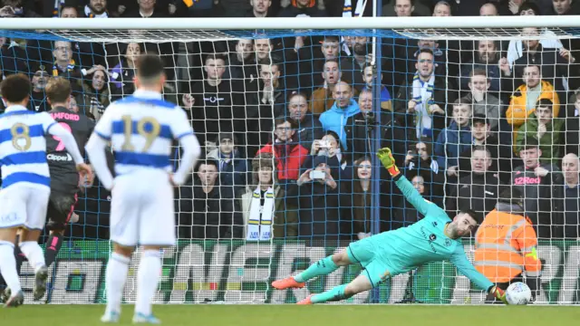 Liam Kelly saves a penalty