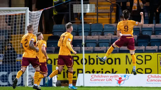 Christopher Long (right) scored a treble for Motherwell