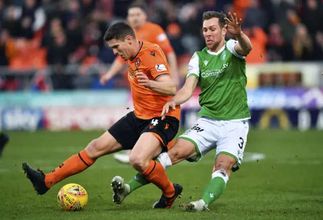 Dillon Powers and Steven Whittaker battle for possession