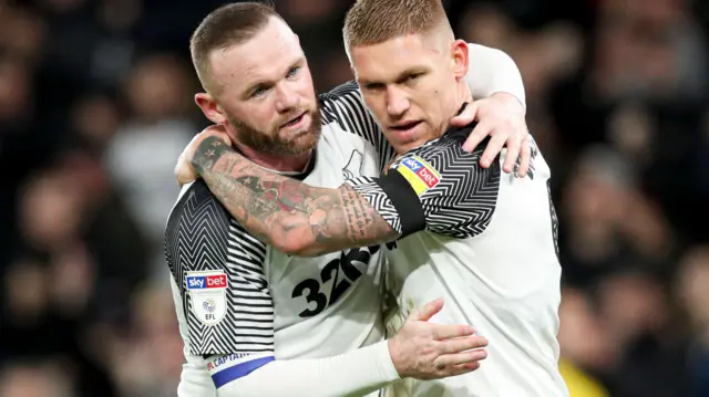 Wayne Rooney and Martyn Waghorn