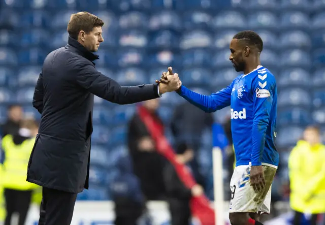 Steven Gerrard with Rangers' goalscorer Jermain Defoe