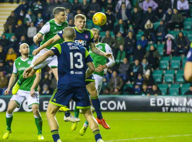 Paul Hanlon nods in the winning goal at Easter Road