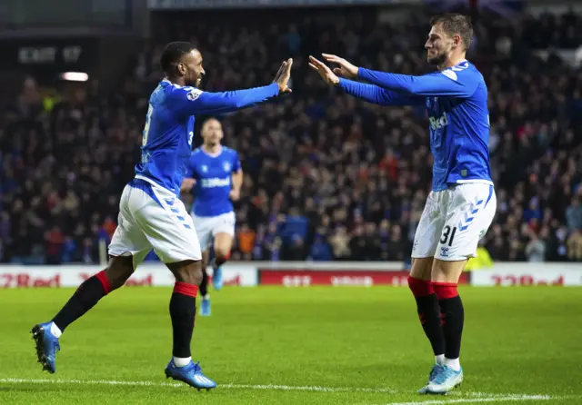 Rangers scorer Jermain Defoe celebrates with Borna Barisic