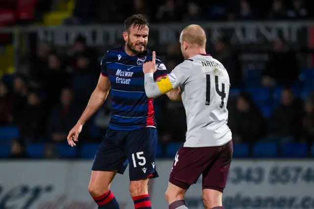 County's Marcus Fraser argues with Hearts' Steven Naismith