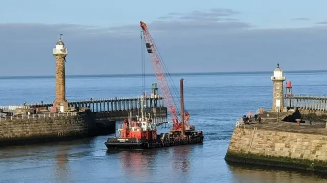 BARGE SHIPPING PIER INSTALLATION