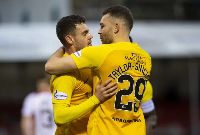 Aaron Taylor-Sinclair (right) scored for Livingston